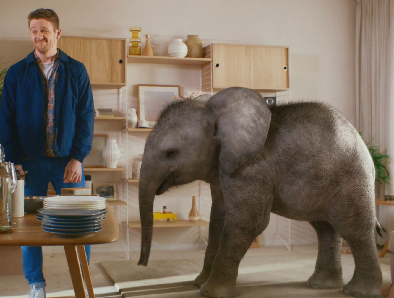 KP peanuts / Glassworks VFX 3d modeled baby elephant inside a house in a birthday party eatinf KP peanuts
